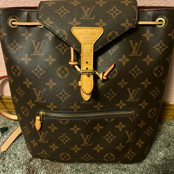 Louis Vuitton Handbags - I am selling a Louis Vuitton Backpack